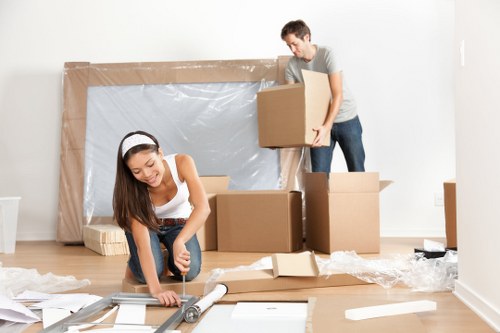 Office removals planning in Claphampark with moving boxes and desks