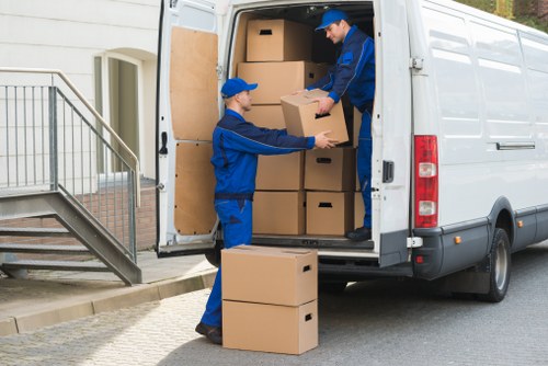 Careful packing for student removals in Claphampark with labeled boxes