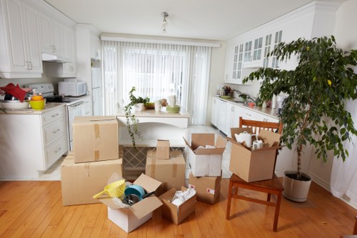 Household boxes and furniture being loaded for Claphampark removals