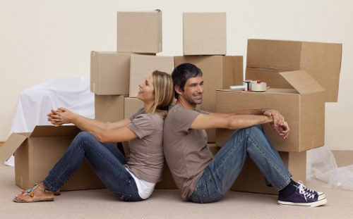 Carefully wrapped fragile items packed into strong moving boxes