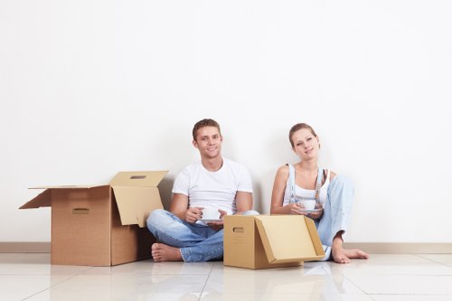 Careful wrapping of fragile household items during a Claphampark move