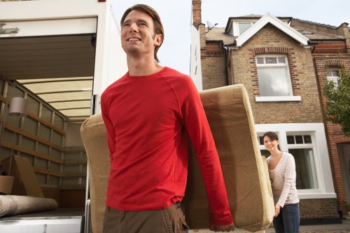 Preparation checklist and packed moving boxes for a house removal