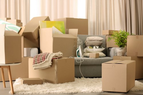 Packed office equipment ready for commercial moves in Claphampark