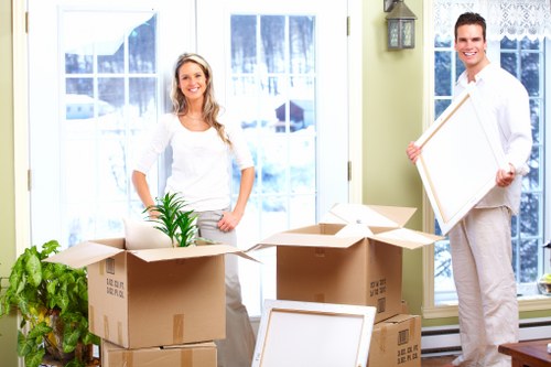 Packing fragile items securely for a flat removal in Claphampark